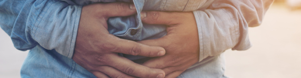 Businessman stomachache selective focus